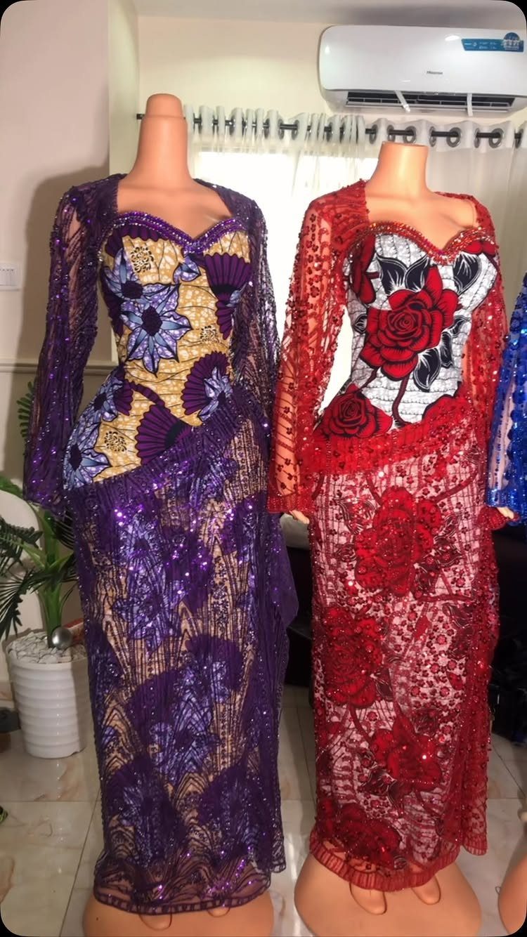 Two mannequins wearing sequined purple and red gowns with vibrant floral print bodices.
