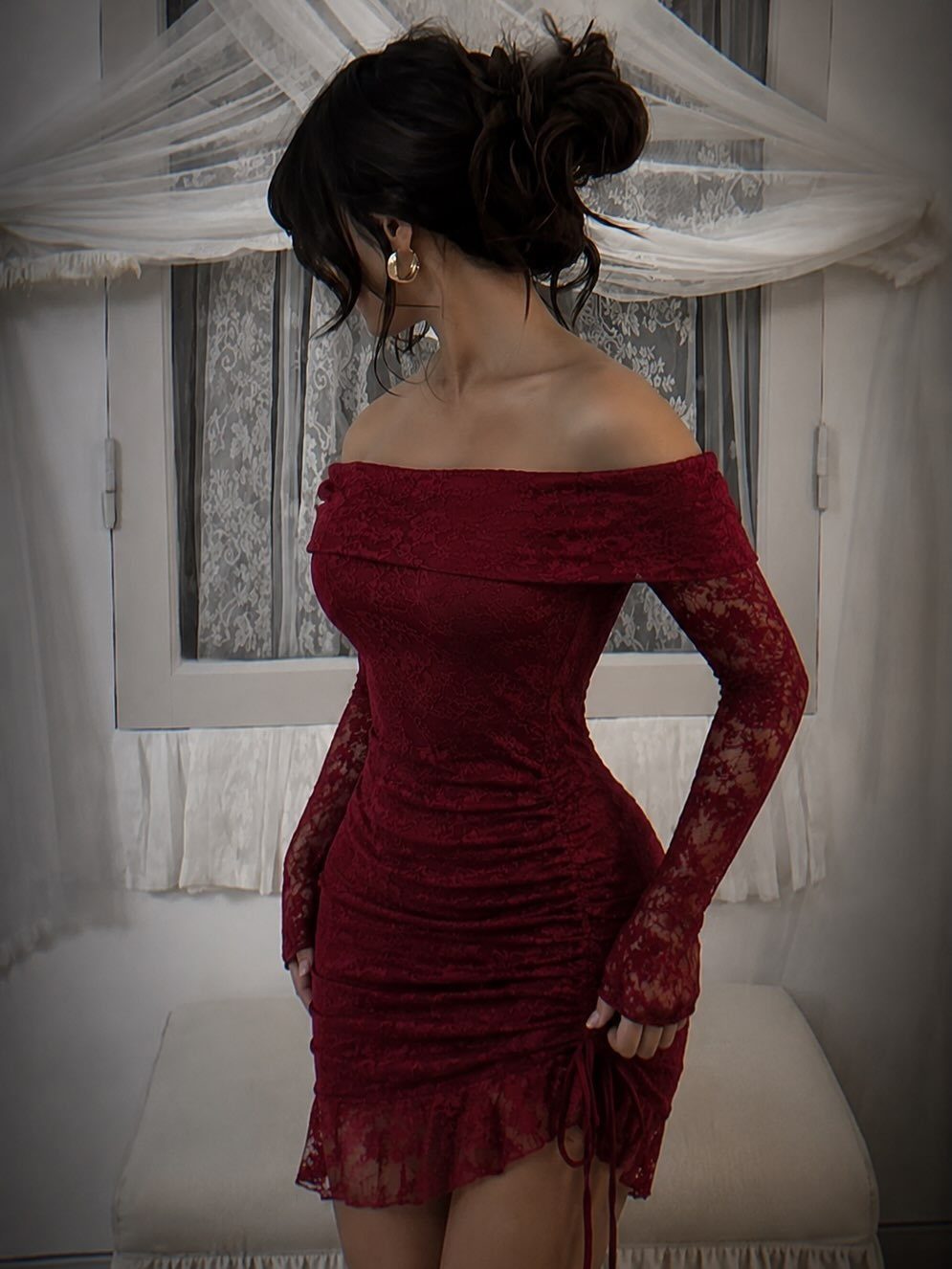 Lace Dress Short Ideas: 5 Looks for Parties and Dates 2 Woman wearing a short, off-the-shoulder red lace dress with long sleeves indoors.