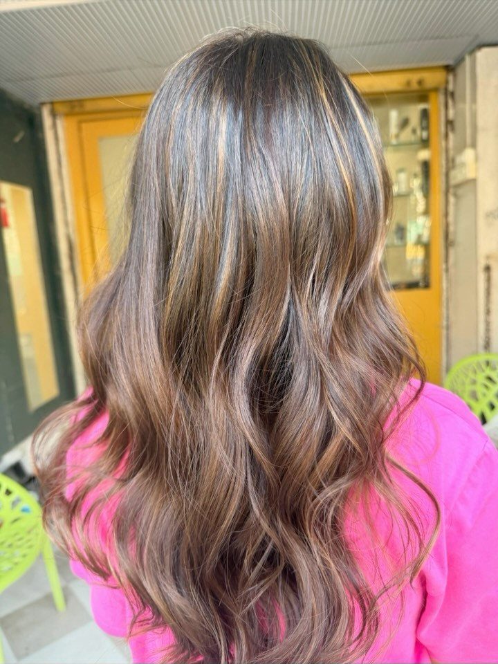 12 Long Brown Hair Ideas with Highlights, Curls and Layers 8 Long wavy brown hair with warm cinnamon balayage highlights from the back view.