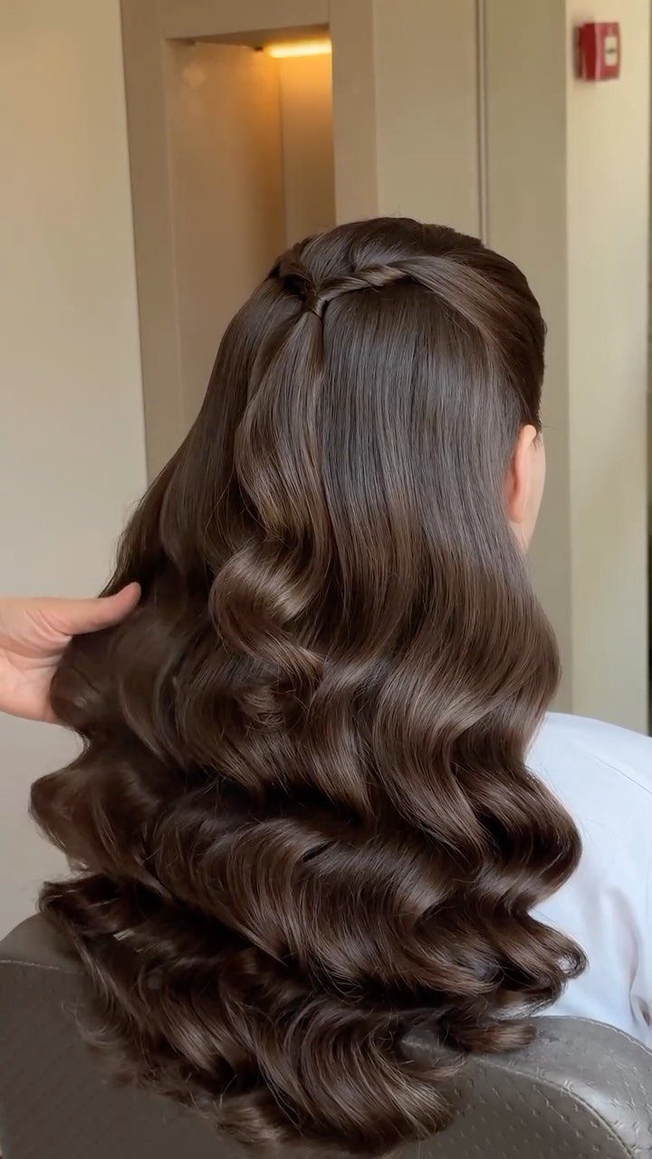 12 Long Brown Hair Ideas with Highlights, Curls and Layers 9 Long dark brown hair styled in glamorous Hollywood curls with a small crown braid