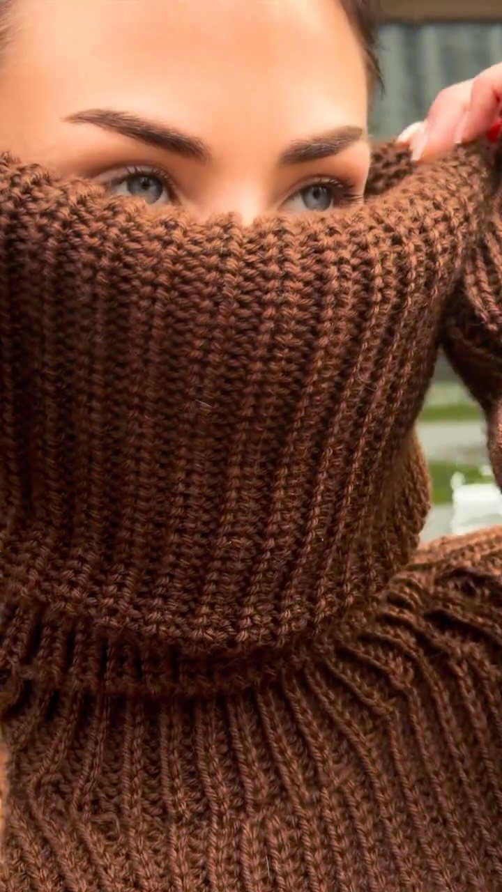 13 Winter Wear Ideas for Women: Coats, Knits and Boots 6 Woman wearing a brown chunky knit sweater with a high oversized collar.